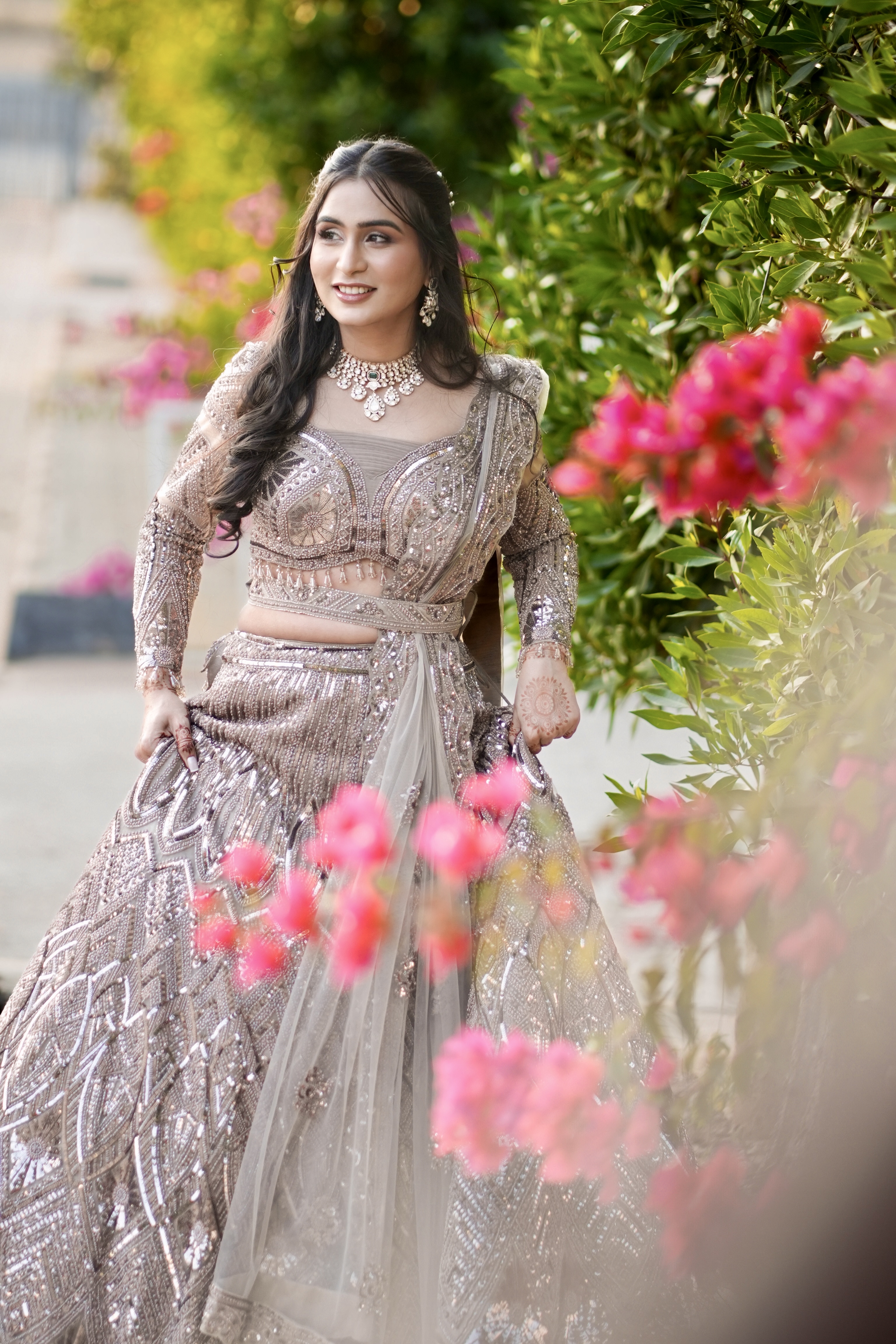 Bride standing outdoors in soft natural light
